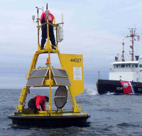 Moored buoy being serviced (Courtesy of NOAA/NDBC)